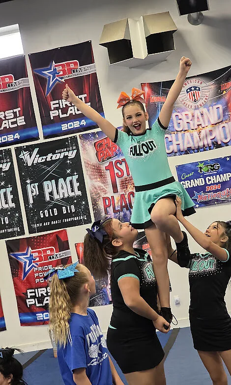 Full Out athlete celebrating a win